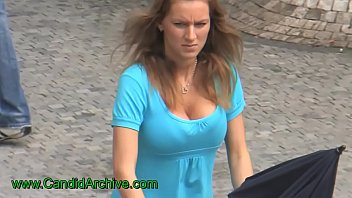 Busty candid girl walking down the street, nice cleavage, bouncing boobs