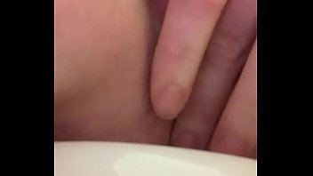 Playing with my pussy at work in the bathroom