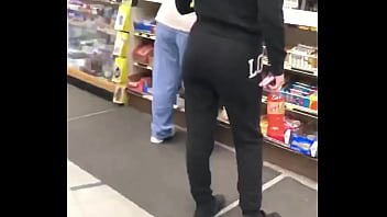 Mom and daughter buying snacks