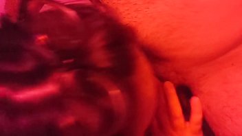 Hot MILF with big tits gives a blowjob in red light titty fucking and cumshot